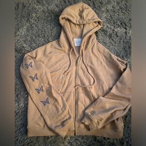 American Eagle zip up Hoodie size xs tan with butterflies on the sleeve